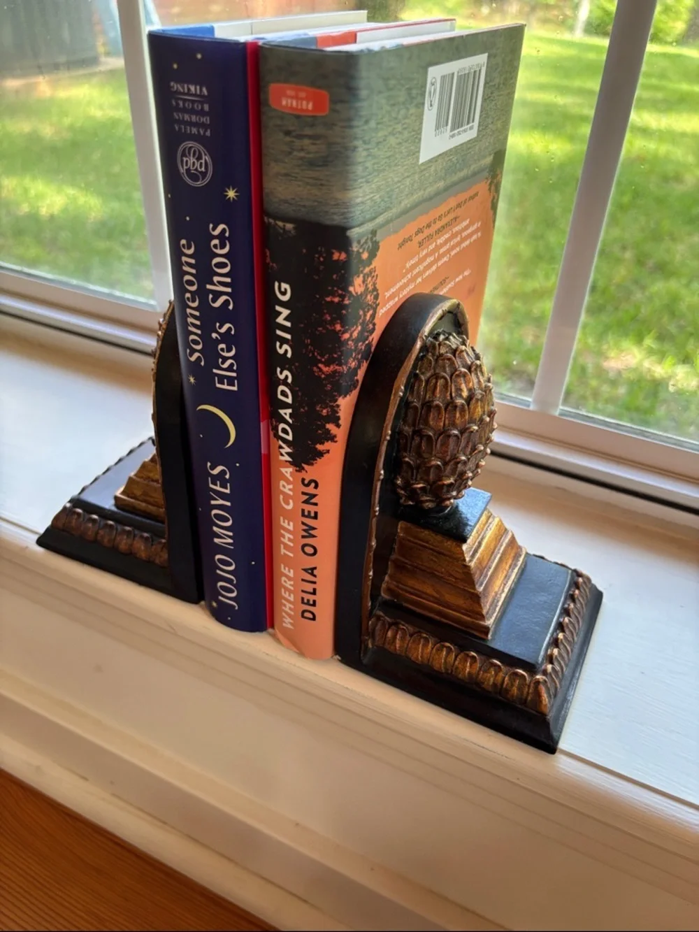 Set Of Bookends Featuring Pineapple Finial Design Atop A Tiered Base.